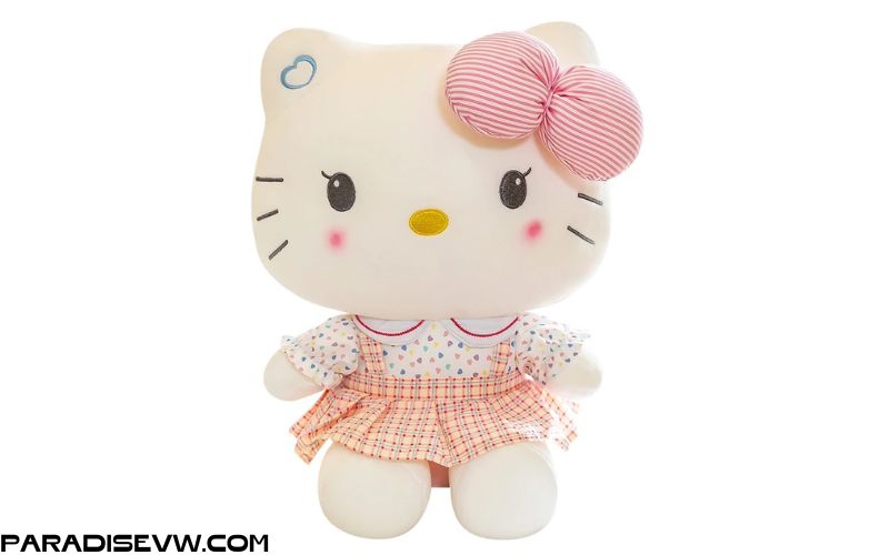 Gấu bông Hello Kitty áo trái tim mặc váy yếm dễ thương