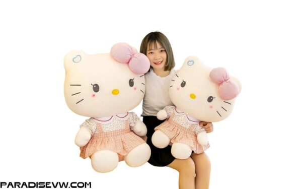 Gấu bông Hello Kitty áo trái tim mặc váy yếm dễ thương